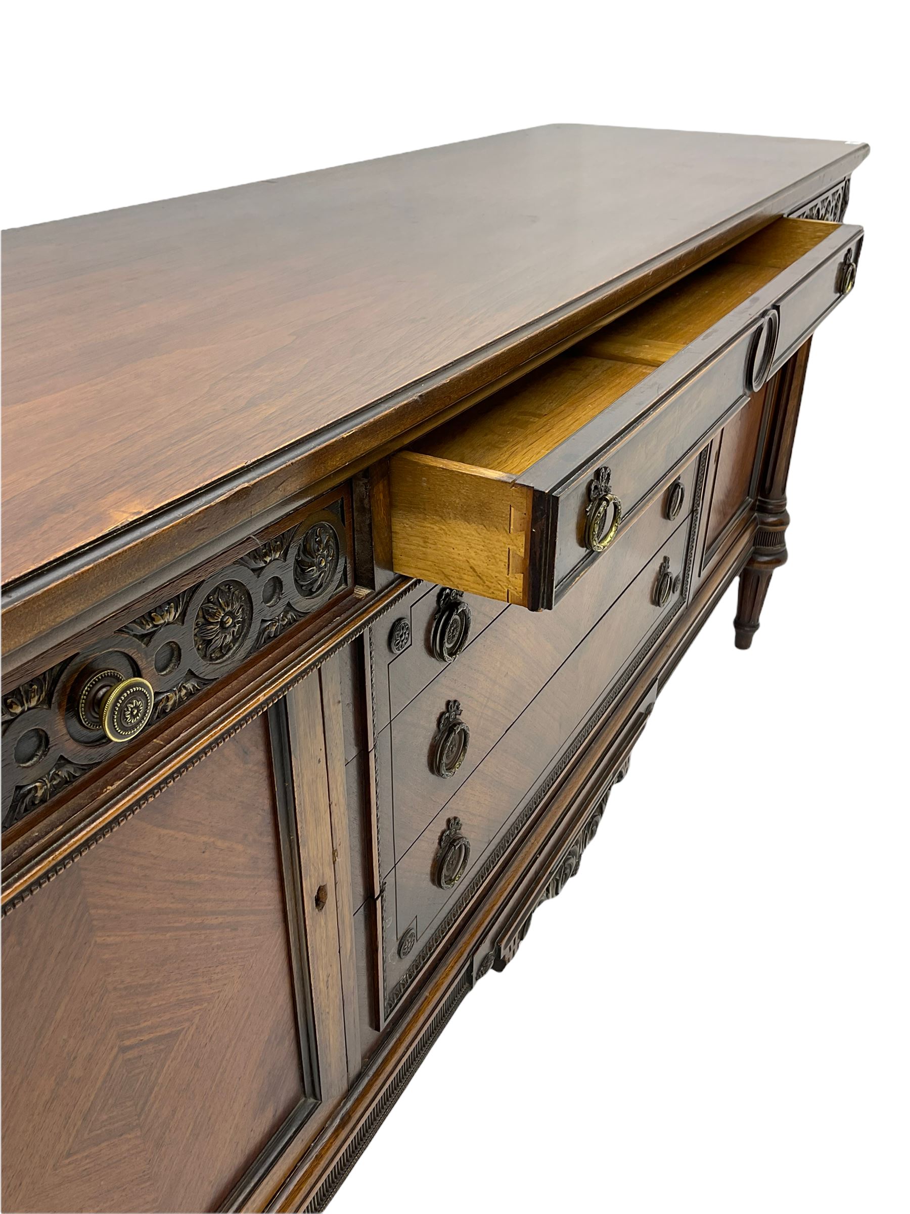 Early 20th century French walnut sideboard, fitted with six drawers and two cupboards