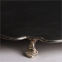 Mid 20th century silver tray, with shaped rim and upon three scroll feet, William Suckling Ltd, Birmingham 1946, D36cm