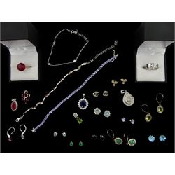 Silver stone set jewellery including two pairs of diamond earrings, diamond pendant, opal and white topaz earrings, tanzanite bracelet, ruby bracelet, garnet pendant, ruby and diamond pendant, stone set earrings and pendants