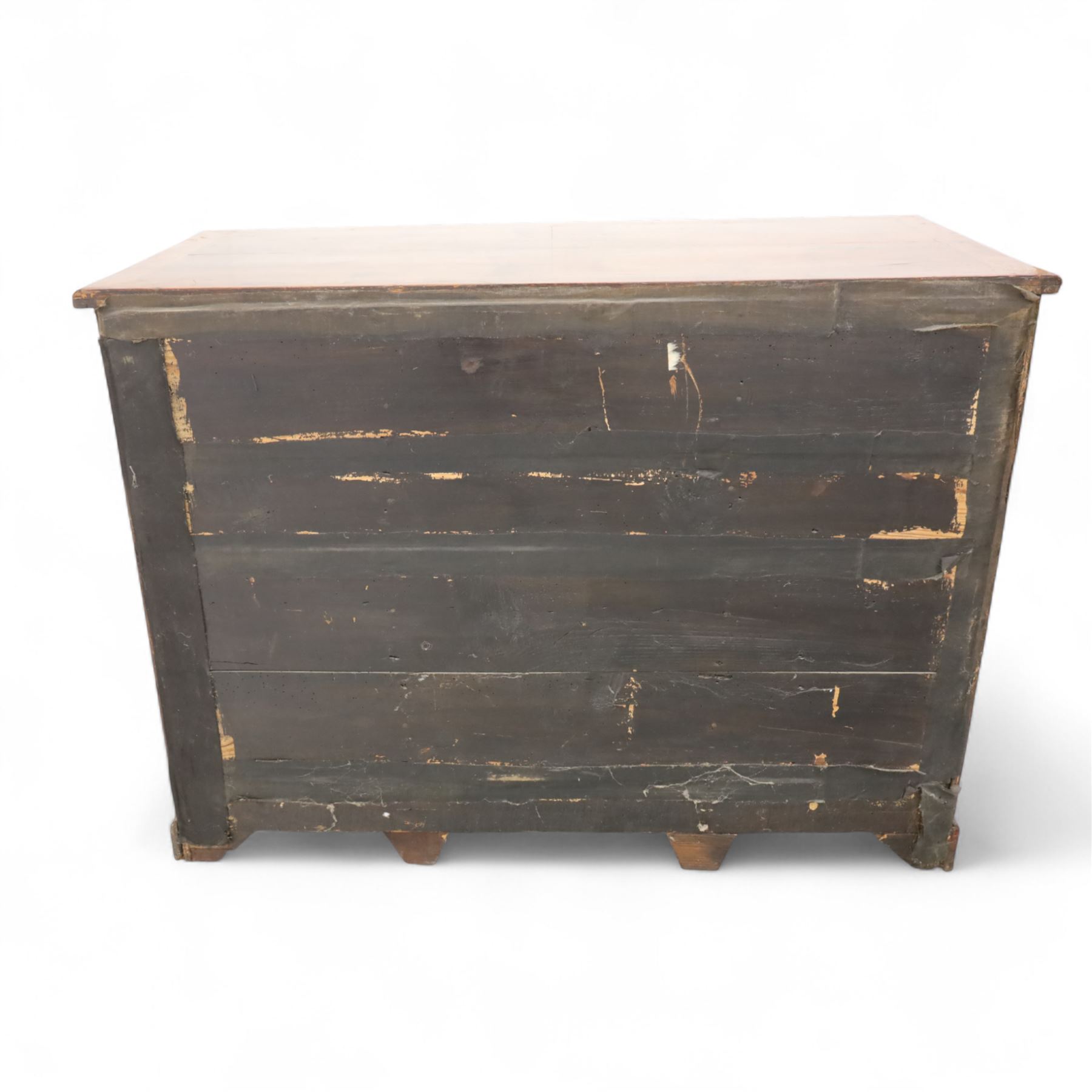 Early 20th-century Georgian-style walnut kneehole desk, the rectangular top with feather cross-banded border, above an arrangement of eight short drawers flanking a central cupboard door, fitted with brass backplate handles, raised on bracket feet