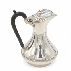 1930s silver hot water pot, of bellied form engraved with monogram to body, with Bakelite type handle and urn finial, hallmarked Fattorini & Sons Ltd, Birmingham 1938, H23cm