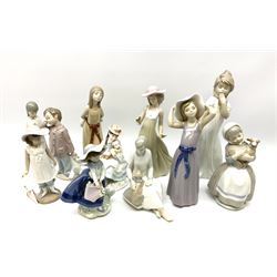 A group of ten Spanish figures, to include five Nao examples, and three Lladro examples, etc., plus a Coalport figure 'Best Friends'. 