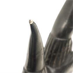 African carved hardwood ebonised figures of a rhinoceros and hippopotamus, each with stylised incised detail and polished dark finish, largest H 61cm, W 91cm)
