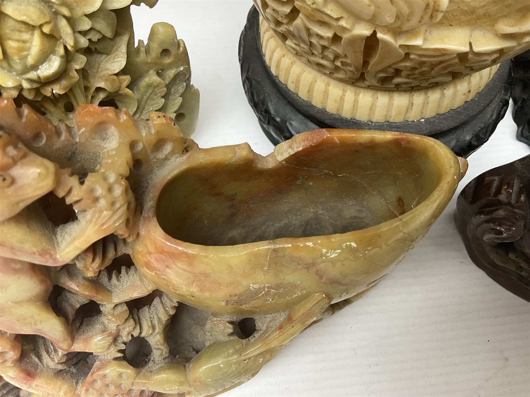 Collection of hardstone and soapstone, including hardstone seal carved temple dogs finial, inscription on base, together with inkwells, vases etc  