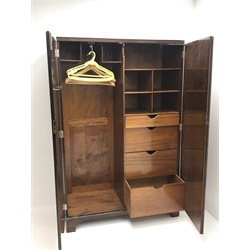  Mid 20th century walnut gentleman's wardrobe, quarter book matched veneered doors, hanging space, drawers and shelves to the interior, W113cm, H174cm, D52cm  
