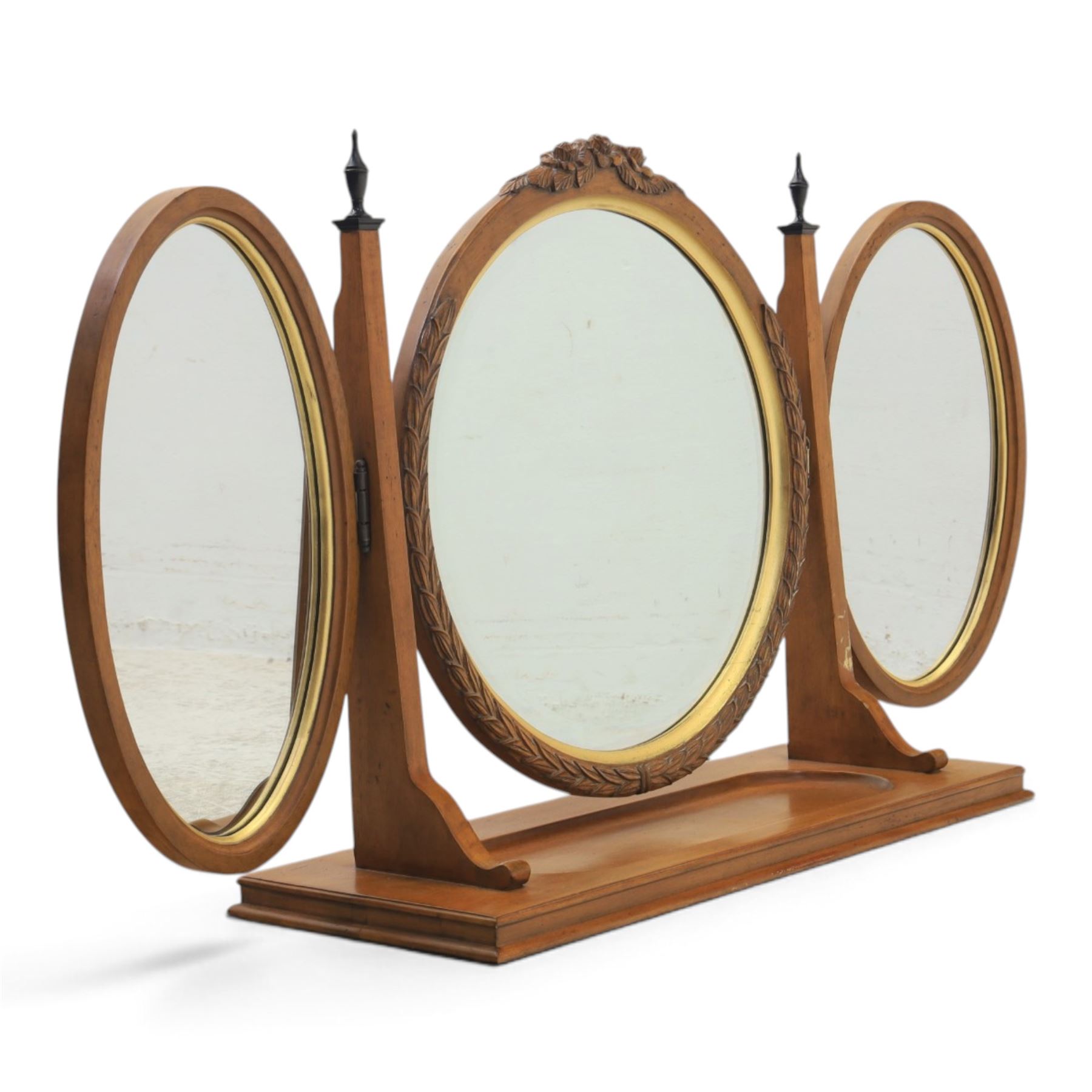 And So To Bed - 'Louis XV' triple dressing table mirror, central circular bevelled mirror, enclosed by parcel gilt with carved edge, flanked by two oval mirrors, the base with a well for trinkets 