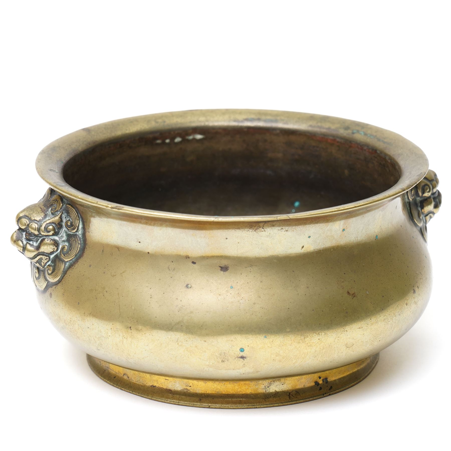 Chinese Ming dynasty gilt bronze censer, of circular bellied form with temple lion mask handles, upon a circular foot, six character Xuande mark to base, D15.5cm