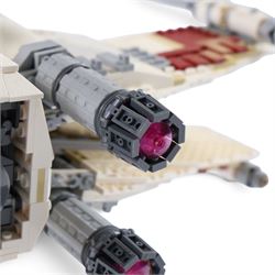 Three Lepin Star Wnrs built models, comprising Red Five X-Wing Starfighter no. 05039, Millennium Falcon no. 05132 and Super Star Destroyer no. 05028
