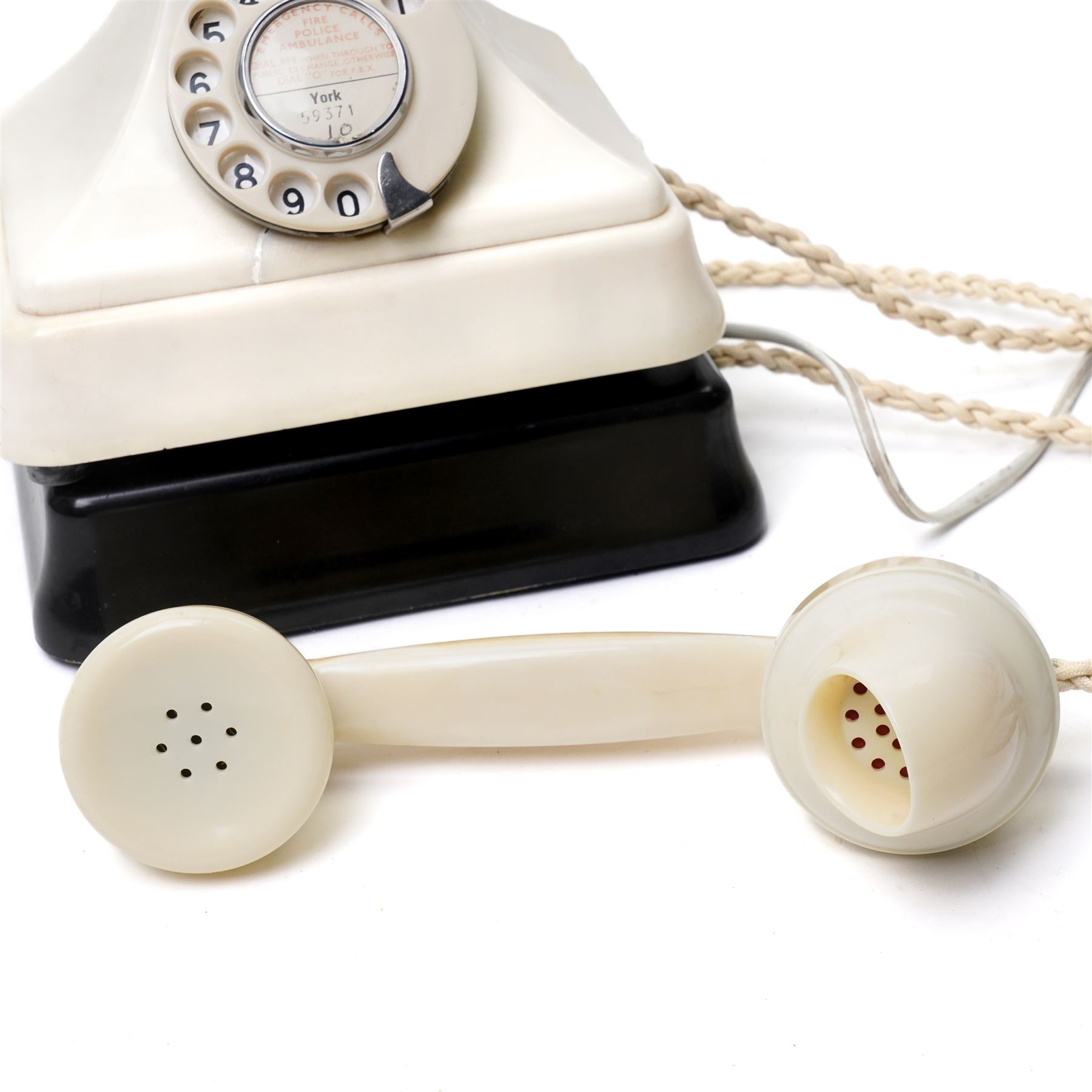 Cream Bakelite telephone, with York Emergency Calls panel, including stand H24cm 