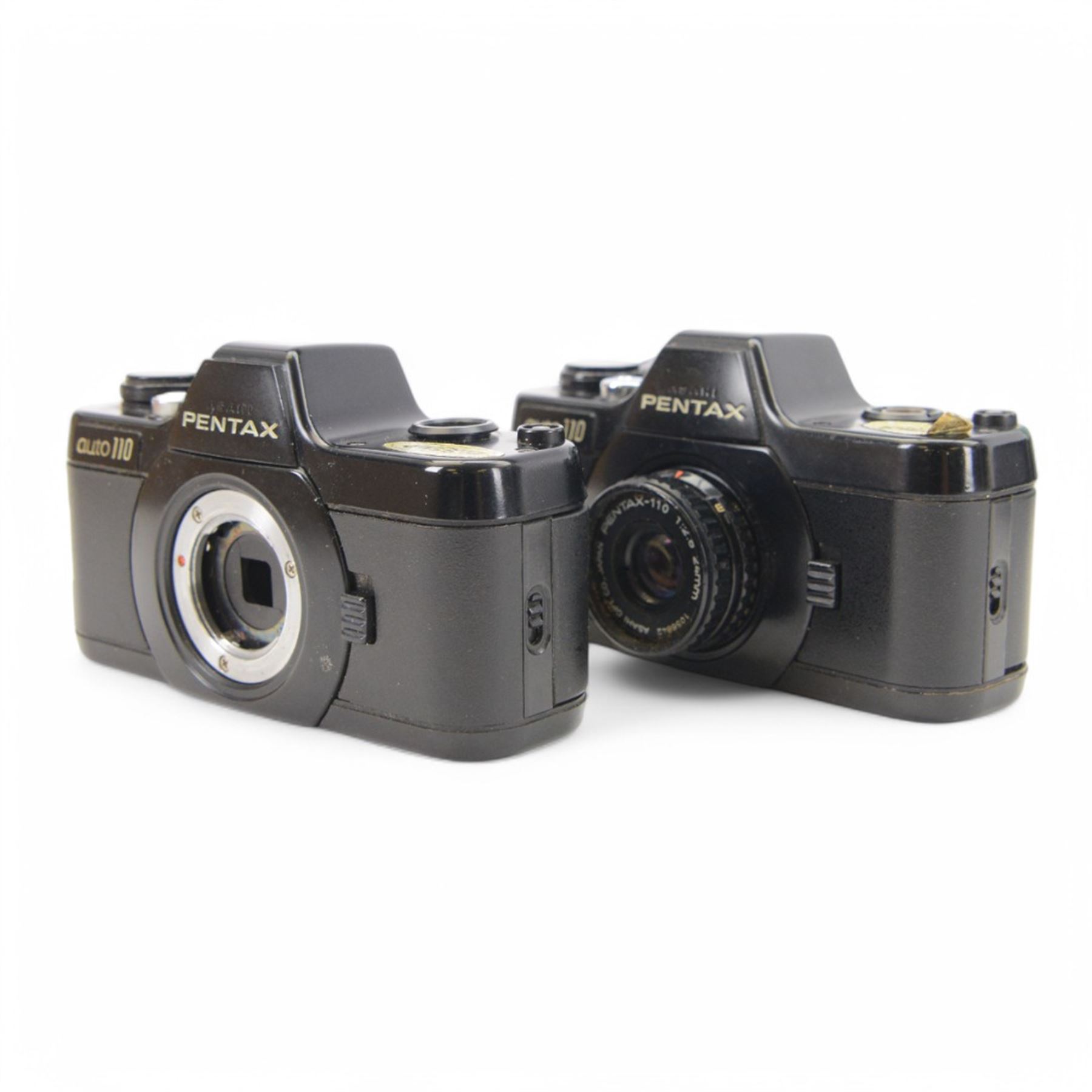 Pentax Auto 110 camera outfit, comprising two camera bodies, serial nos. 2055664 & 1062072, Pentax-110 1:2.8 18mm lens serial no. 1363262, Pentax-110 1:2.8 50mm lens serial no. 1345010, Pentax-110 Zoom 1:2.8 20-40mm lens serial no. 1007131, winder serial no. 450034 and flash no. AF130P, collection of filters and a pair of Perl 8x20 field binoculars, all housed within a flight case