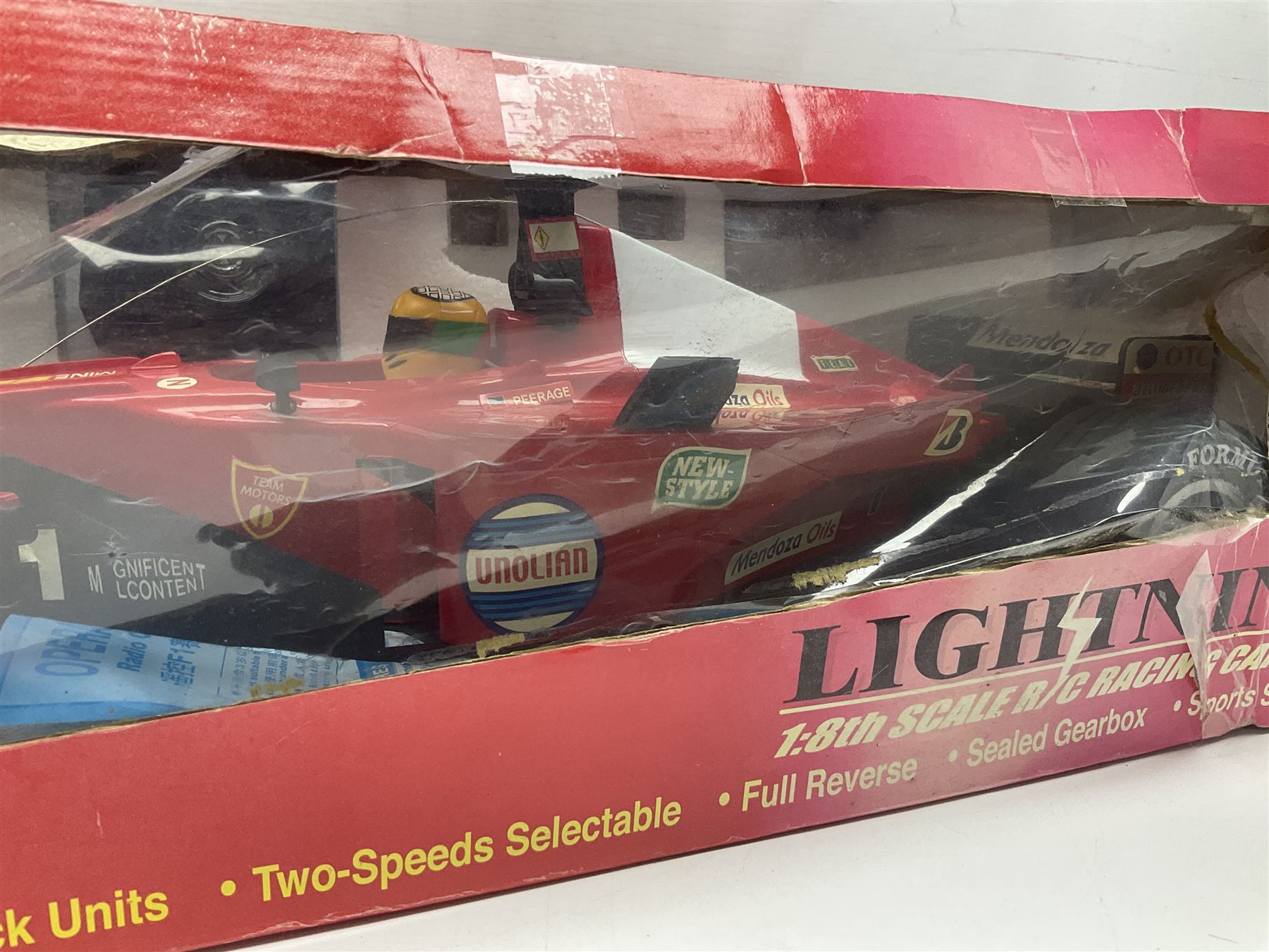 PMS Lightning 1:8 scale remote control racing car; Soma Sonic Man battery operated electronic sounds and light action figure; and CGL Galaxy Invader 10000 computer space battle game; all boxed (3)