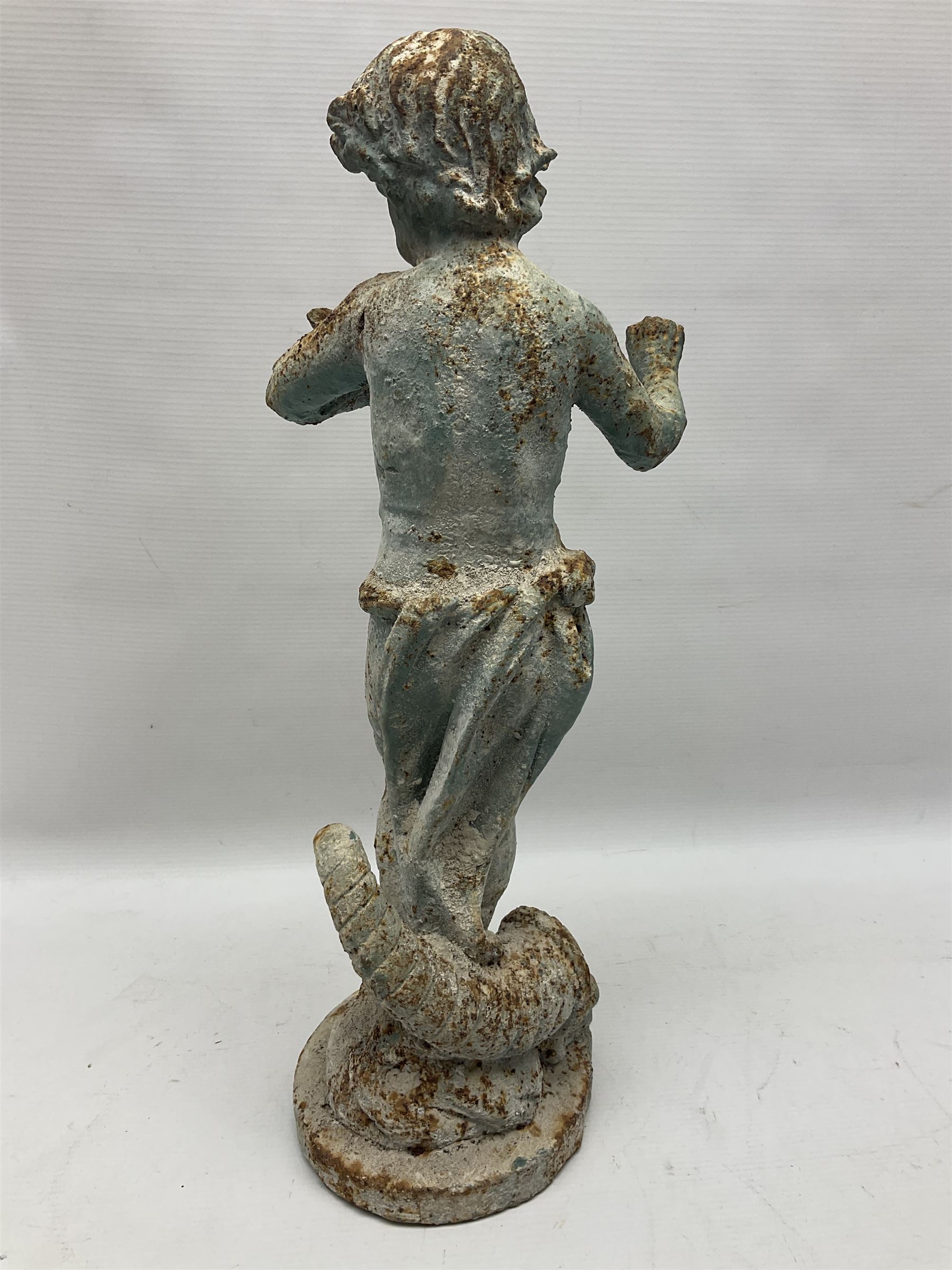 Garden ornament modeled as a putti with butterfly, H50cm