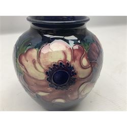 Moorcroft Anemone pattern vase of ovoid form, tube lined with large flowerheads and foliage upon cobalt blue ground, with painted and impressed marks initialled W.M beneath, H12.5cm