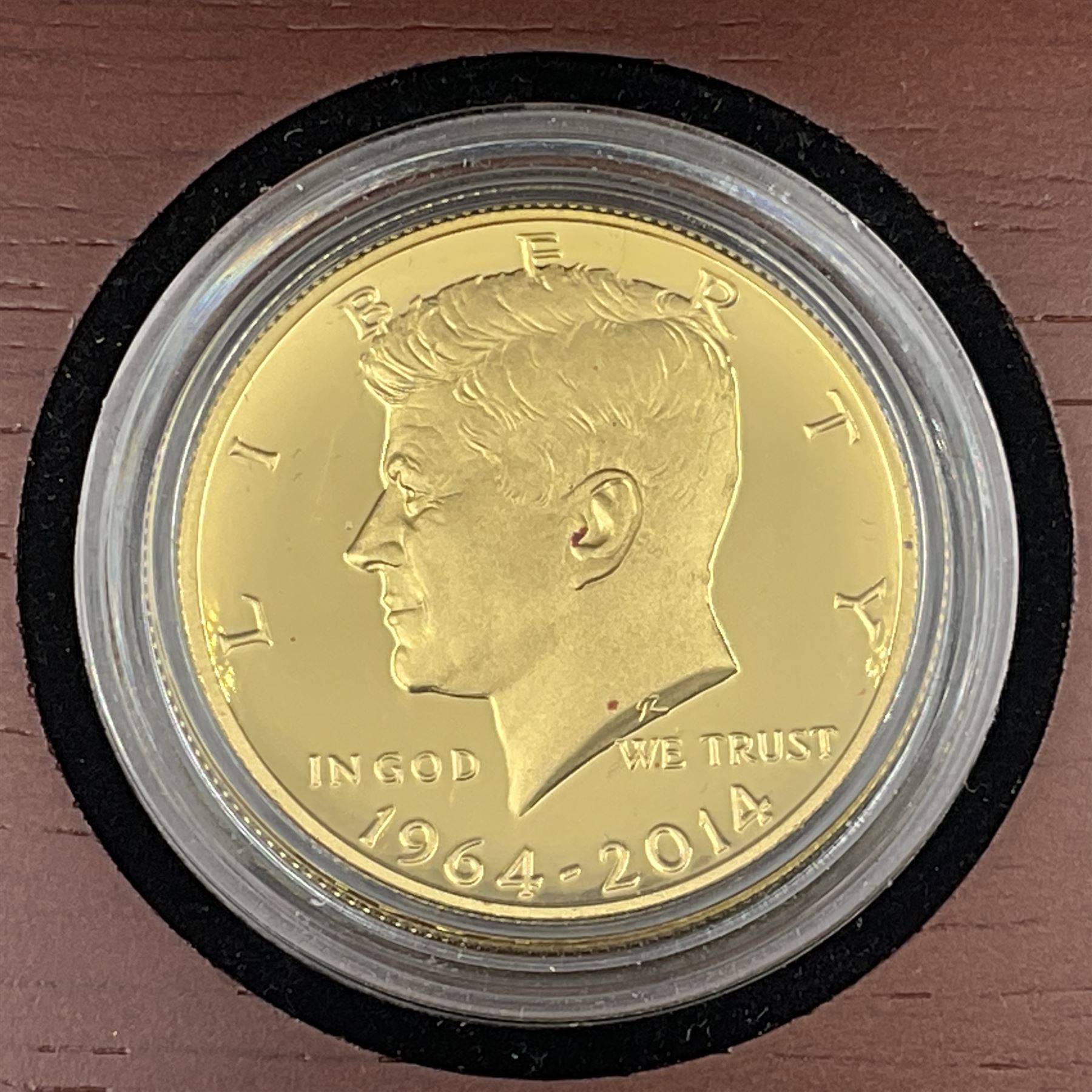United States of America 2014 '50th Anniversary Kennedy half-dollar' gold proof coin, weighing 0.75 troy ounces of fine gold, cased with certificate