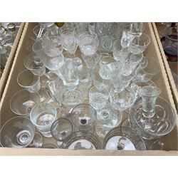 Quantity of glassware to include jar with cur fan and buzz patterns and star cut base, possibly American, with turned wood lid, 19th century drinking glasses, scent bottles, jelly moulds, etched drinking glasses, celery vase etc in three boxes