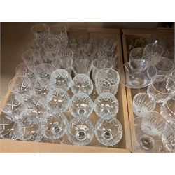 Quantity of cut and moulded glassware to include decanters with spirit labels, set of six flashed hock glasses, other flashed coloured glassware, glass pedestal footed bowl, tumblers, wine glasses etc in five boxes