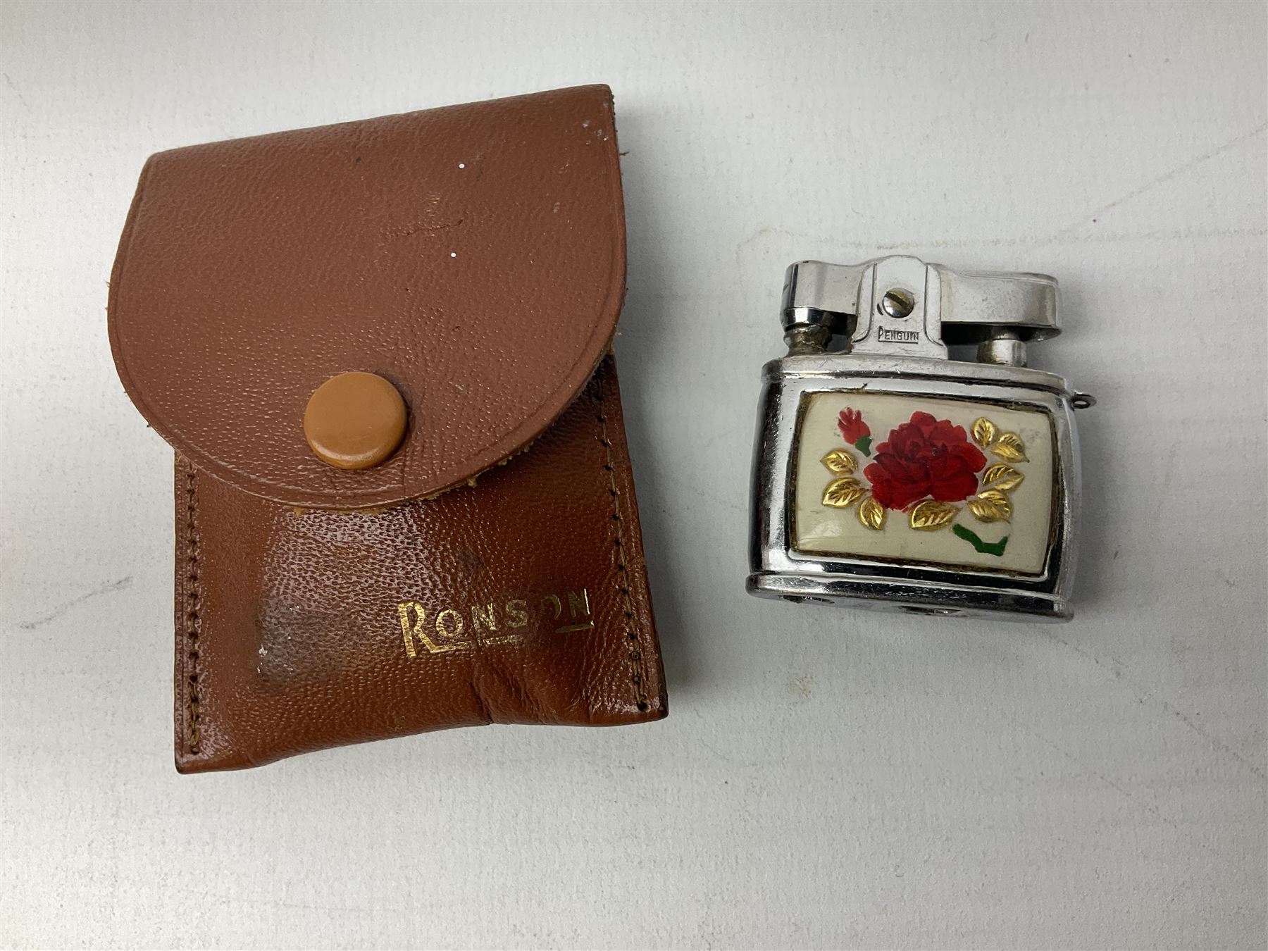 Collection of lighters to include examples by Ronson, Kingsway and Penguin, mother of pearl and engine turned examples, together with quantity of cigarette cases