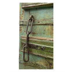 Pair of green-painted Indian doors, c.1860–1880, made from solid teak featuring original iron work and hand-painted finish
