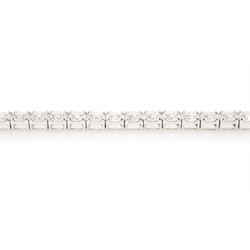 18ct white gold diamond bracelet, four claw set with fifty-one round brilliant cut diamonds, stamped 750, total diamond weight approx 6.35 carat