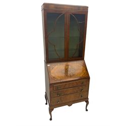 Early 20th century walnut bureau bookcase, two glazed doors over fall front, fitted with three drawers, on shell carved cabriole feet