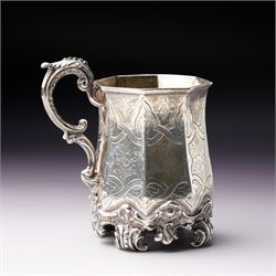 Victorian silver christening mug of panel sided design with gilded interior, engraved decoration and scroll handle and feet H10cm London 1848 Maker Charles Reily & George Storer