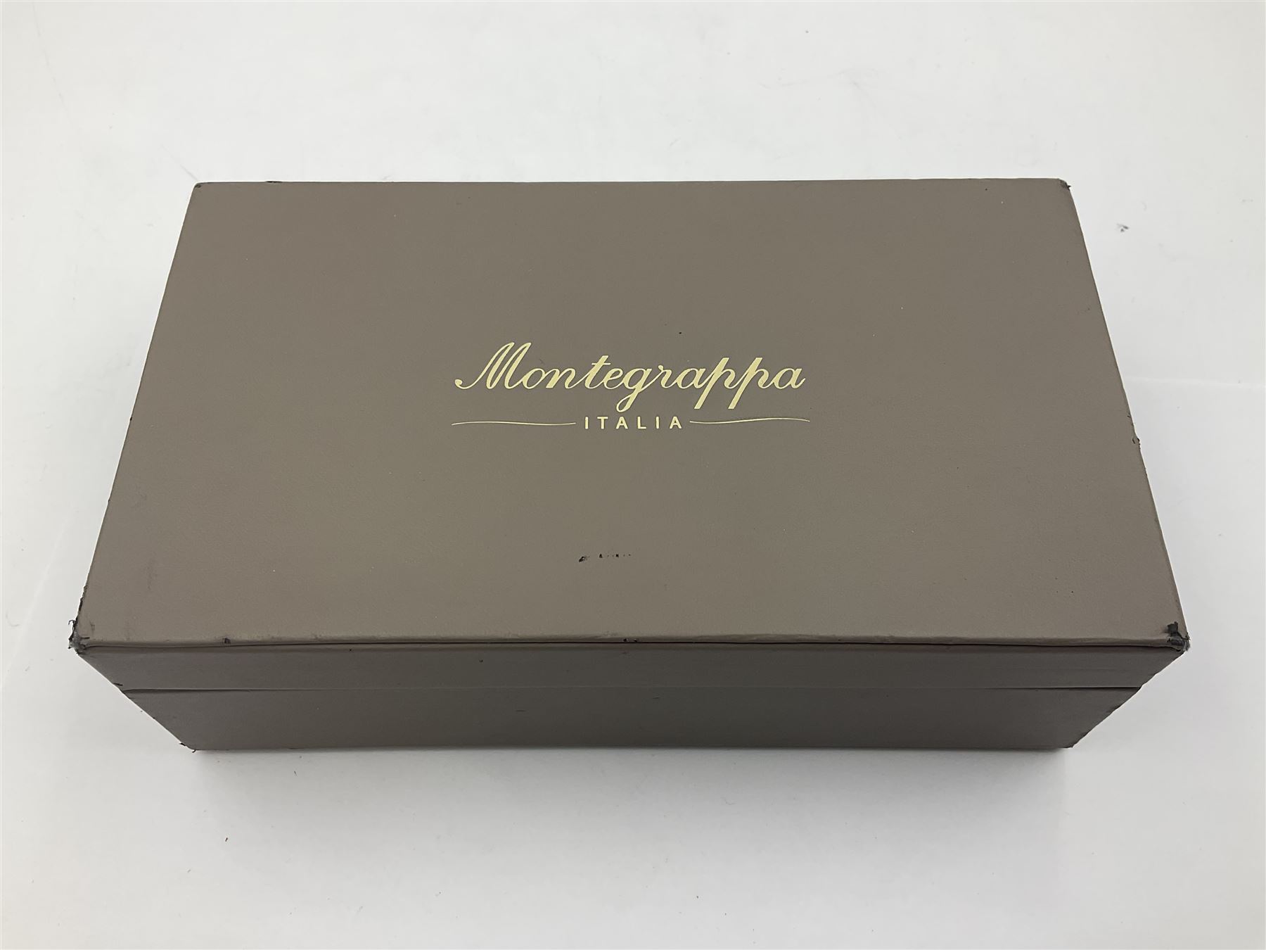 Montegrappa Emblema ball pen, the blue pearl marbled barrel of octagonal form with silver mounts and terminal with 1912 emblem, stamped 925 and clip with roller, in box, L13.5cm