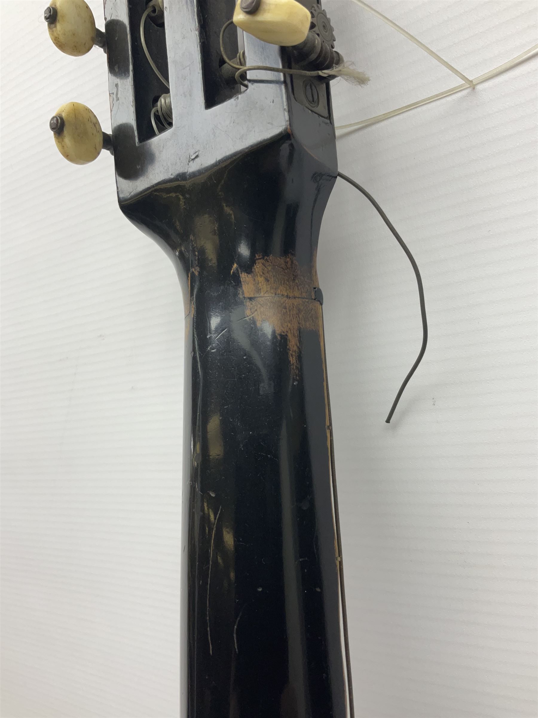 19th century Continental parlour guitar for restoration or display, with maple back and sides,  spruce top, scalloped neck and bone pegs; bears inset plaque to head 'Lapaix Paris 1830' and 'John Eastwood Teacher of the Guitar' paper label with manuscript note 'Fine Old Guitar Restored 1888 by JCB Leeds' L92cm