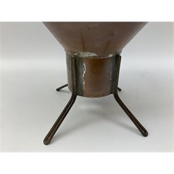 Agricultural copper corn funnel, H32.5cm, another similar copper funnel and copper warming platter of oval form, with twin handles on four supports, with removeable warming plate, L49cm