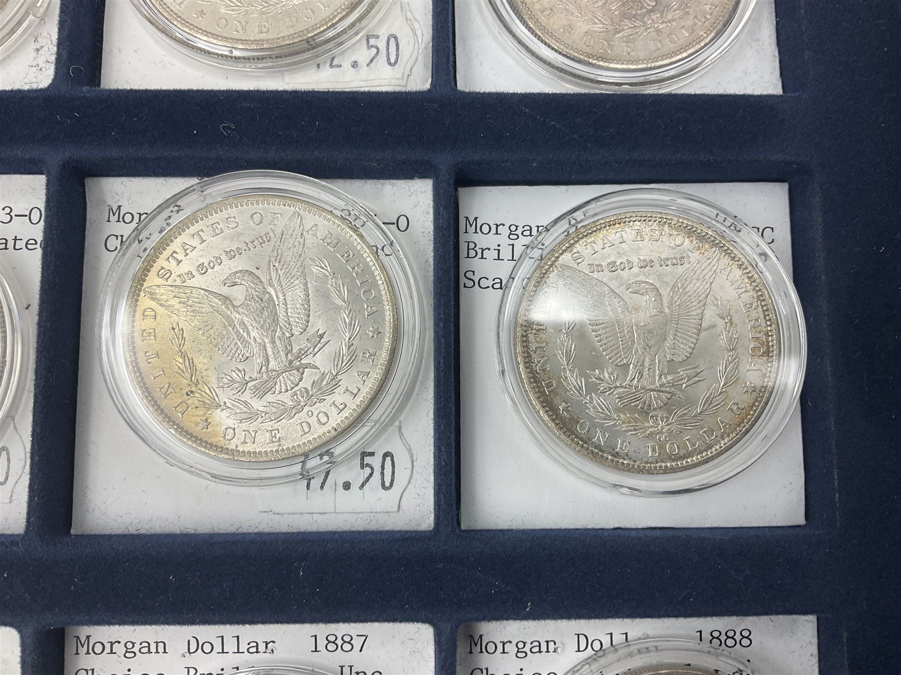 Twelve United States of America silver Morgan dollar coins, dated 1878 S, 1879 S, 1880 S, 1881 S, 1882 O, 1883 O, 1884 O, 1884 CC, 1885 O, 1886, 1887 and 1888