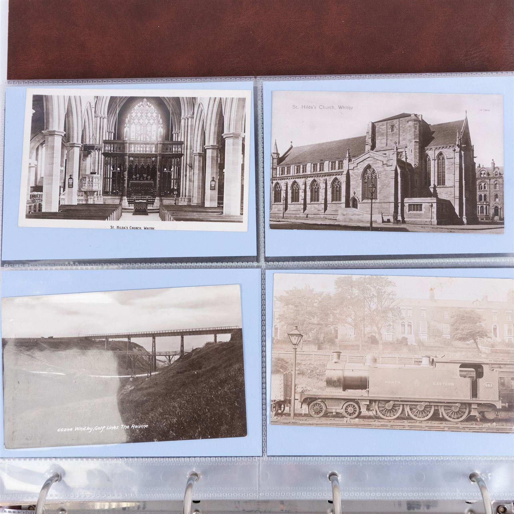 One-hundred and seventy two early 20th century Whitby view postcards, including a detailed collection documenting the destruction of Whitby following the bombardment by the German Fleet in 1914, a selection depicting the construction of the pier extensions, the opening of the new river drawbridge, a re-enactment of the medieval tradition of building the 'Penny Hedge' and the 1932 flooding of the town centre, together with a selection depicting social events at Spa, all housed within a Stanley Gibbons Picture Postcard Album