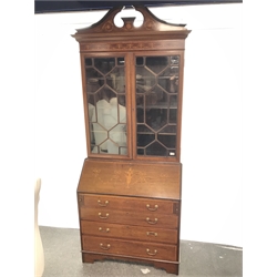  Edwardian inlaid mahogany bureau bookcase, broken swan neck pediment, two astragal glazed doors, fall front enclosing fitted interior above four graduating drawers, plinth base, W98cm, H229cm, D49cm  