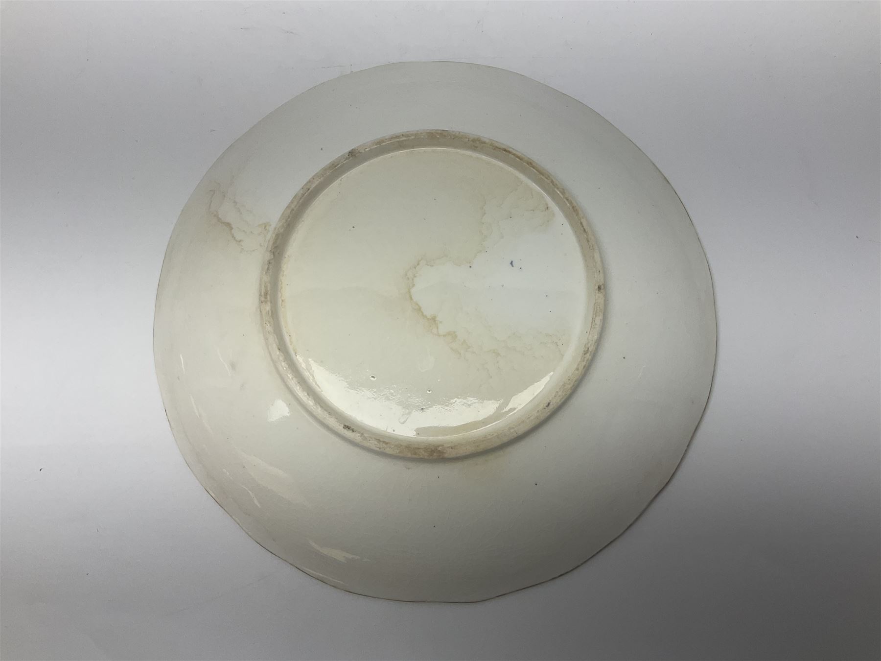 Set of three Victorian teacups and saucers, with matching dessert plate, decorated with a watered silk blue boarder and hand painted floral sprays to the centre 