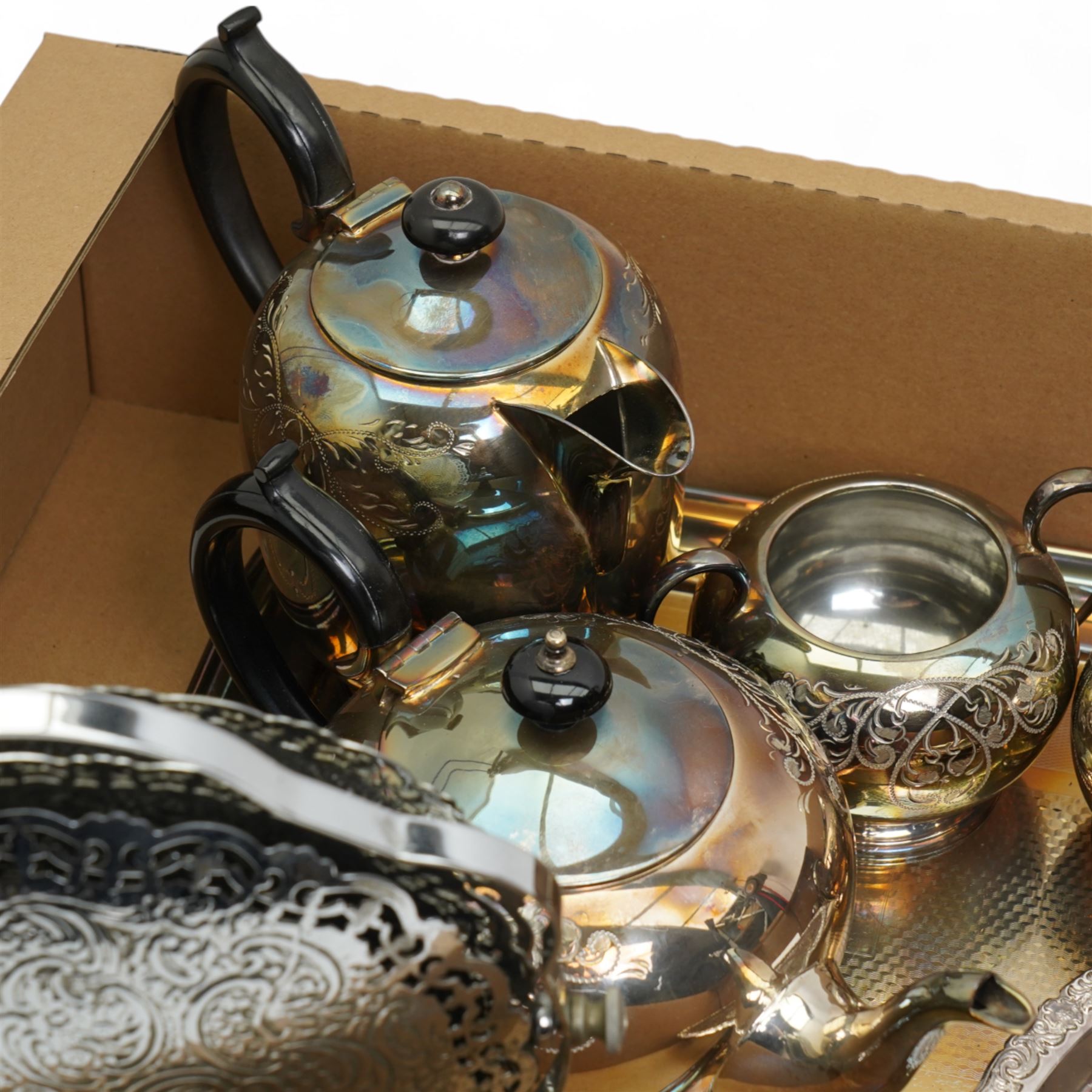 Collection of silver plate, to include apex cruet set with blue glass liners, matching teapot, coffee pot, milk and sugar bowls, and a plated tray, folding cake stand etc
