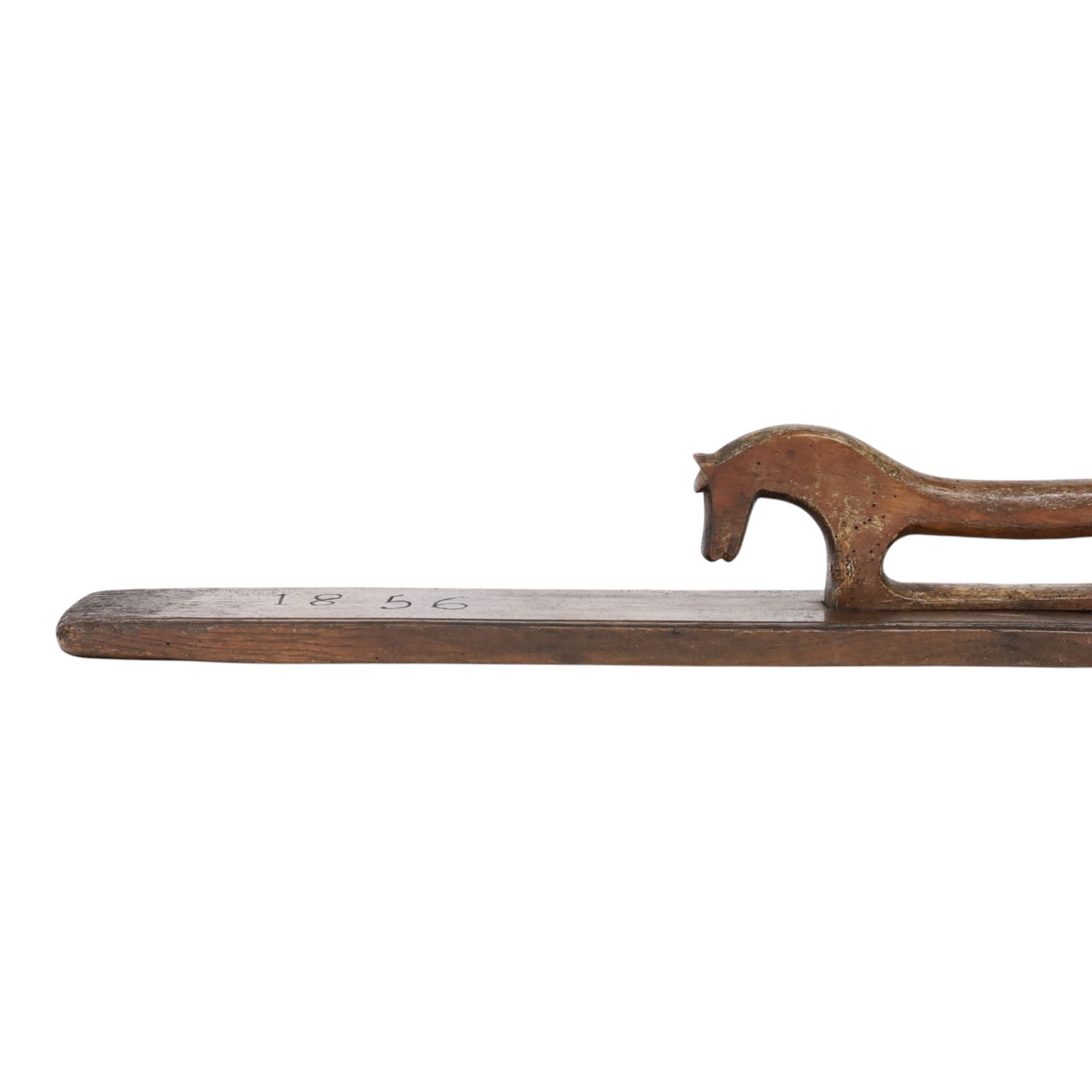 Mid 19th century Norwegian carved mangle board, dated 1856, of rectangular form with stepped edges, and carved dala horse handle, L63cm