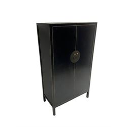 Chinese design black lacquered wardrobe, two cupboard doors enclosing hanging rail and two drawers