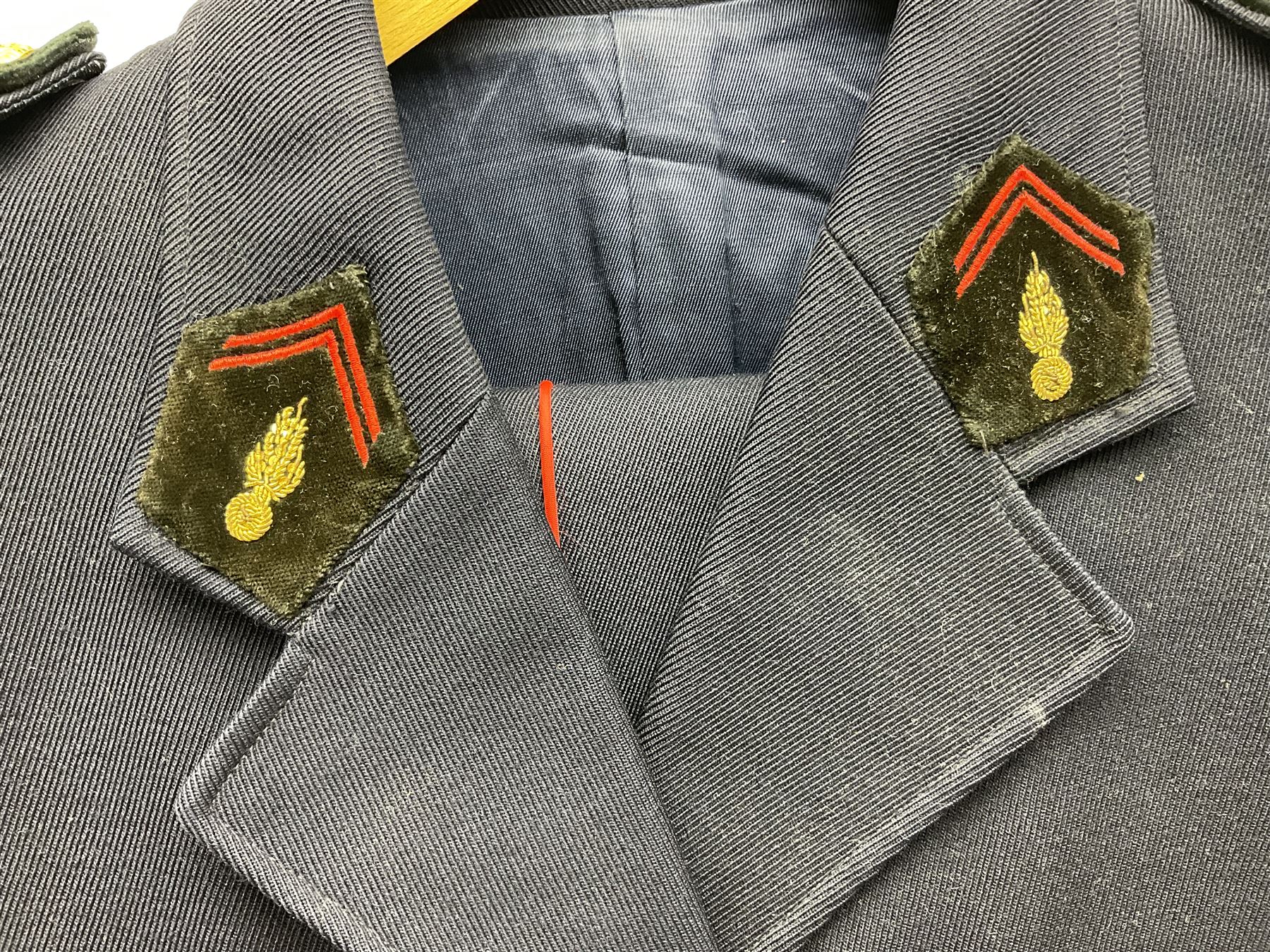 Mid 20th century French Ugeco Nantes first class dress navy blue uniform with ribbon bar with cap, and quantity of Sapeurs Pompiers patches, Sapeurs Pompiers de Caen belt buckle etc