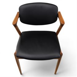 Kai Kristiansen (Danish c.1929-2022) - Pair of mid-20th century teak elbow chairs upholstered in black leatherette