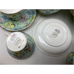 Shelley Melody pattern tea service for six, to include teapot, teapot stand, hot water jug, milk jug, covered sucrier, teacups and saucers, cake plates etc (31)