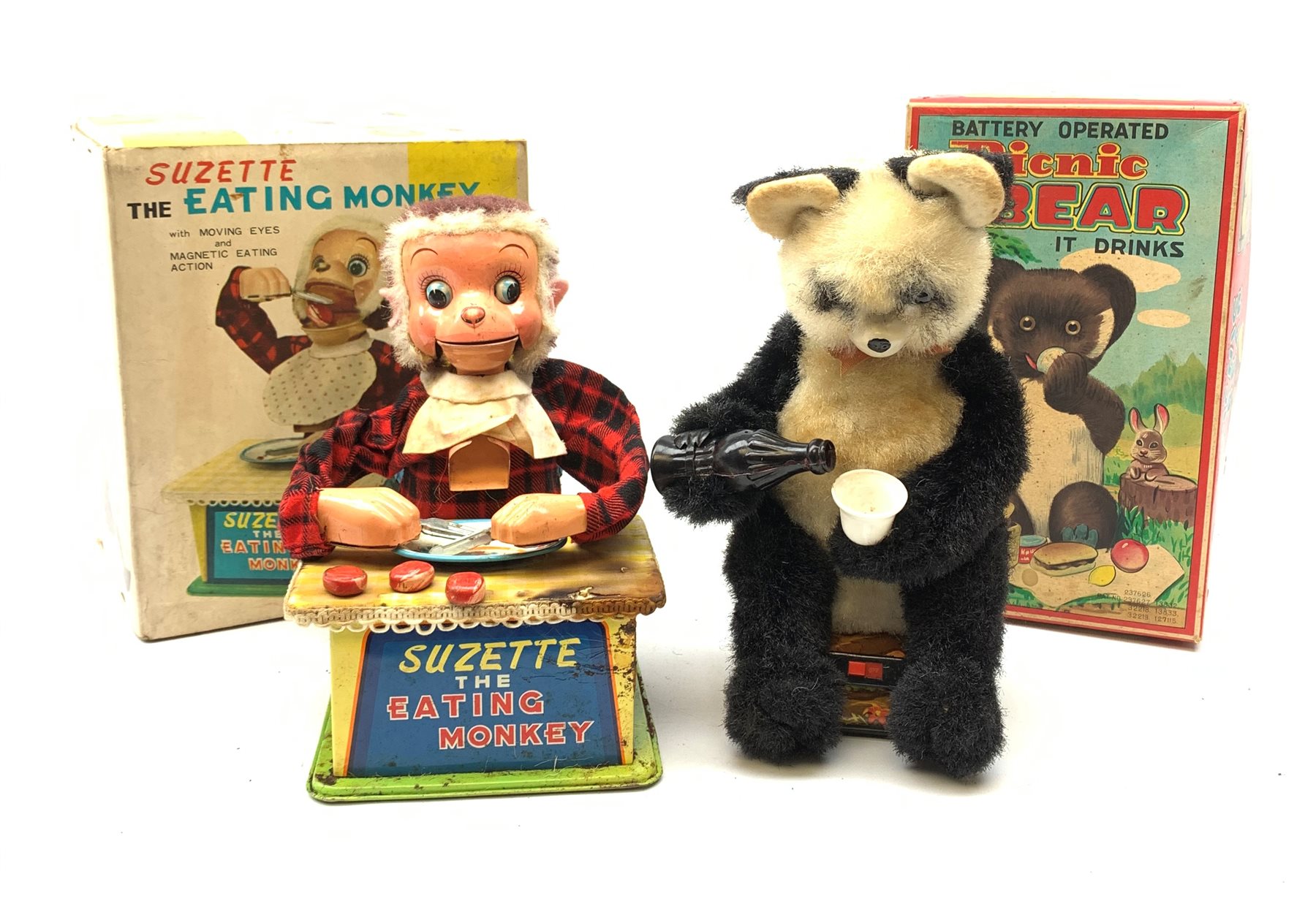  Two Japanese battery operated toys, comprising Pinic Bear, and Suzette the eating monkey, each in box.   