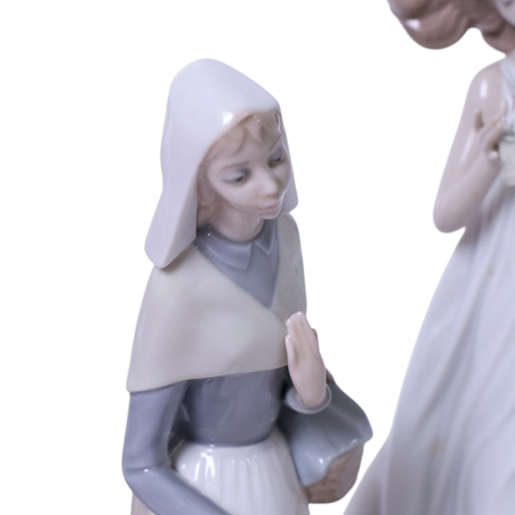 Four Lladro figures, comprising Summer Infatuation 6366, Butterfly Treasures 6777, Girl with Calla Lilies 4650 and Shepherdess with Dog 1034