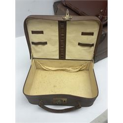 Three shooting sticks, together with four vintage leather brown suitcases of various sizes, largest suitcase H40cm L65cm 
