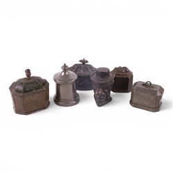Collection of 19th century and later tobacco jars, including two lead examples, caster iro...