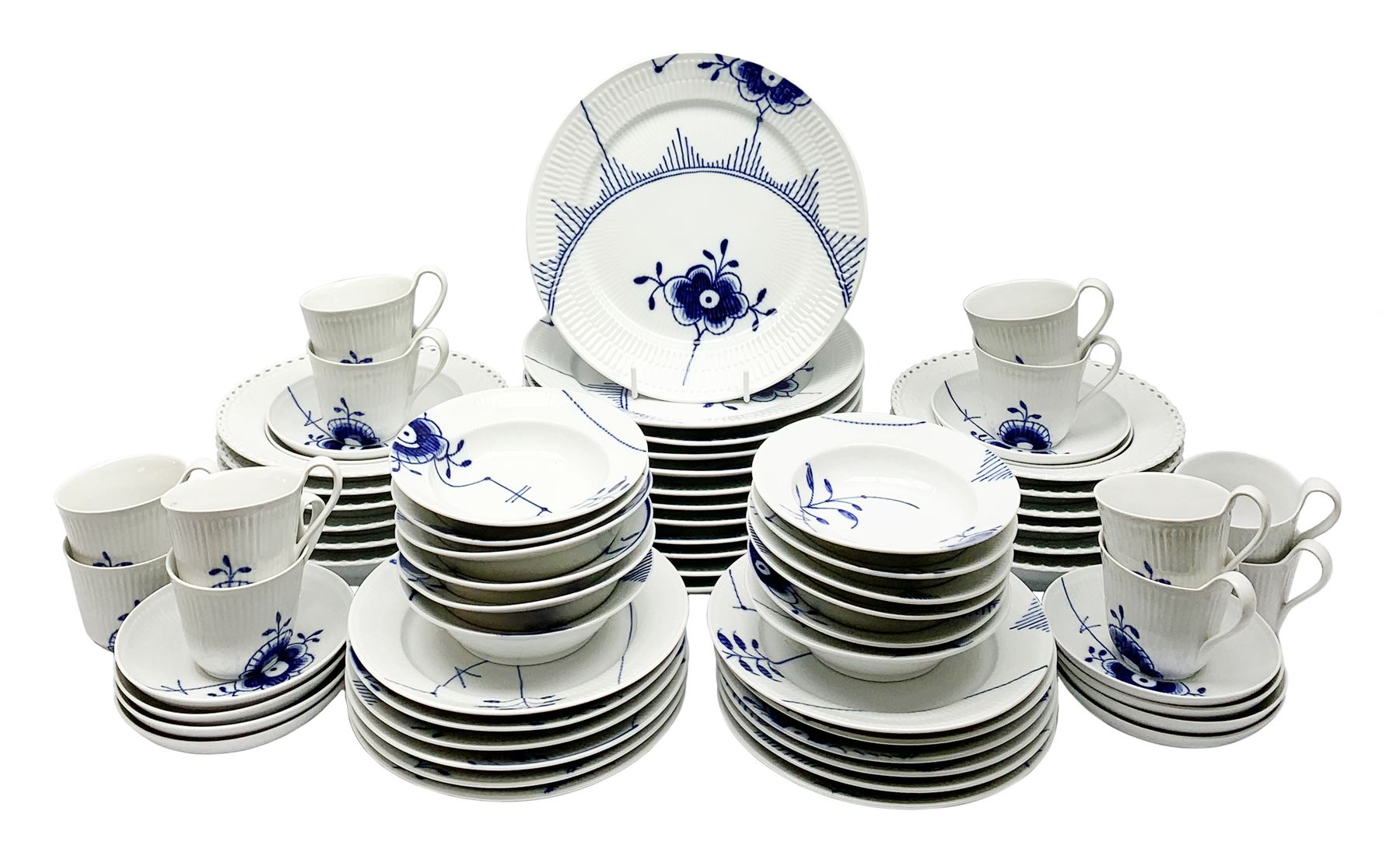 Royal Copenhagen tea and dinner service for twelve place settings, decorated in the Mega Blue Fluted pattern, pattern number 622, comprising dinner plates, salad plates, bowls with pierced rim, smaller bowls, tea cups, and saucers, dinner plates D27.5cm, salad plates D22cm