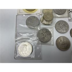 King George VI 1937 crown coin, various commemorative crowns, Queen Elizabeth II Canada 1957 and 1959 fifty cent coins, four Great British five pound coins, United States of America 1964 half dollar etc