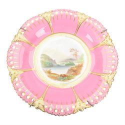 Two 19th century Samson porcelain plates, decorated in the Chelsea style with exotic birds, flowers and insects, each with spurious gold anchor mark verso, largest example D24cm, together with a 19th century dessert plate, possibly Worcester, hand painted with a hummingbird, within a gilt band and pink border, D22.5cm, and a further 19th century dessert plate with shaped and pierced rim, hand painted with a view of Loch Lomond and titled verso, D22cm, (4)