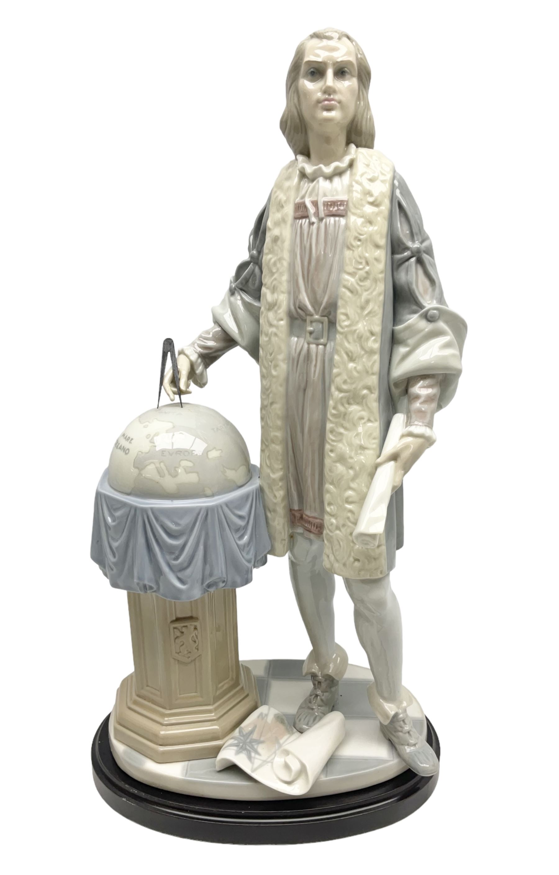 Lladro figure, Columbus, modelled as Christopher Columbus stood by a globe, limited edition 896/1200, no 1432, sculpted by Salvador Furio, with original box, year issued 1982, year retired 1988, H42cm