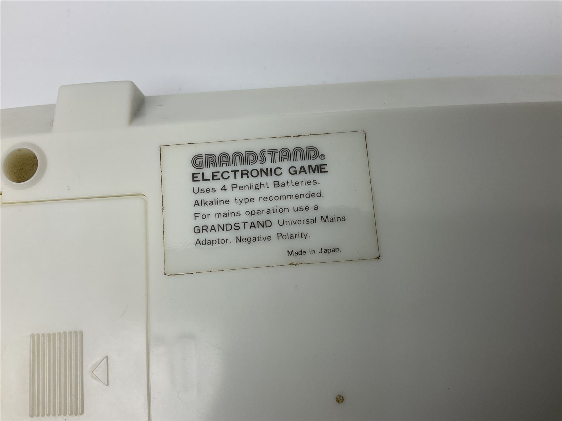 Three late 70s/early 80s handheld electronic games; Bandai Electronics Arcade ‘Gunfighter’ (1980), Grandstand ‘Invader From Space’ (1980), Palitoy ‘Merlin The Electronic Game Machine’ (1979) with game sheet and instruction booklet, all with original boxes (3) 