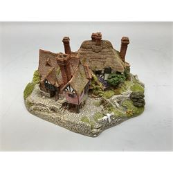 Two limited edition Lilliput Lane cottages, comprising Oakwood Smithy and Blair Athol, both boxed with deeds