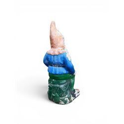 Early large scale composite stone garden gnome, original distressed paint