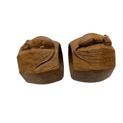 Mouseman - pair of oak napkin rings, of bulbous octagonal form each carved with mouse signature, by the workshop of Robert Thompson, Kilburn, L4.5cm W6cm